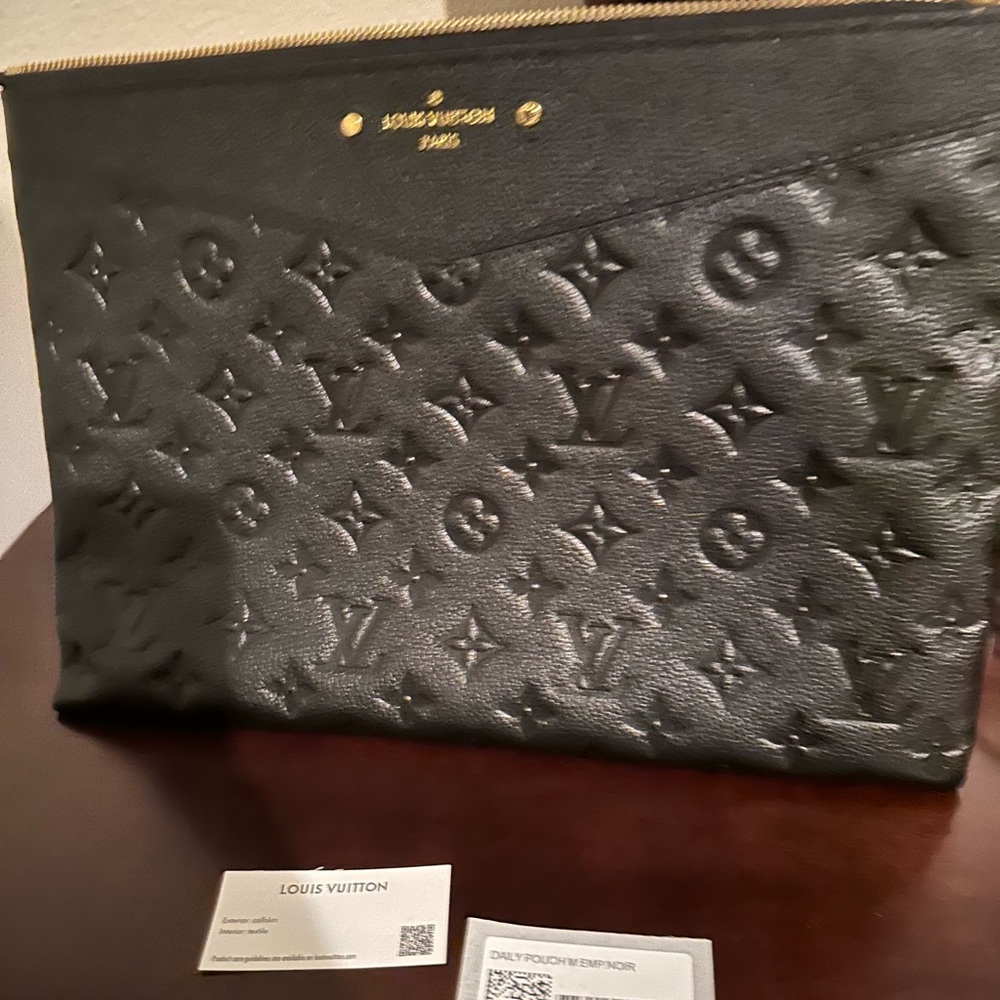 LV daily pouch Monogram Empreinte Leather
